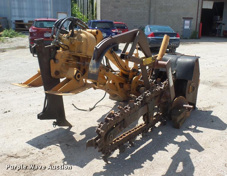image for item DN9993 Case 660 cable plow/trencher attachment