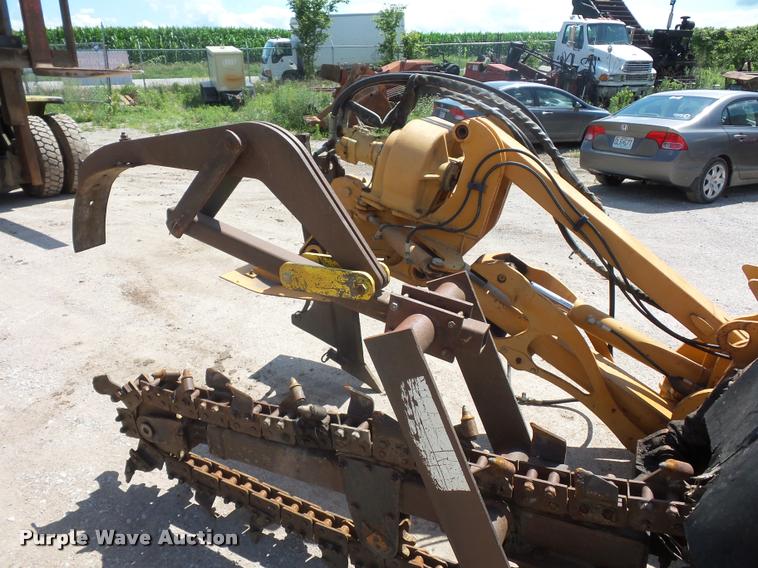 image for item DN9993 Case 660 cable plow/trencher attachment
