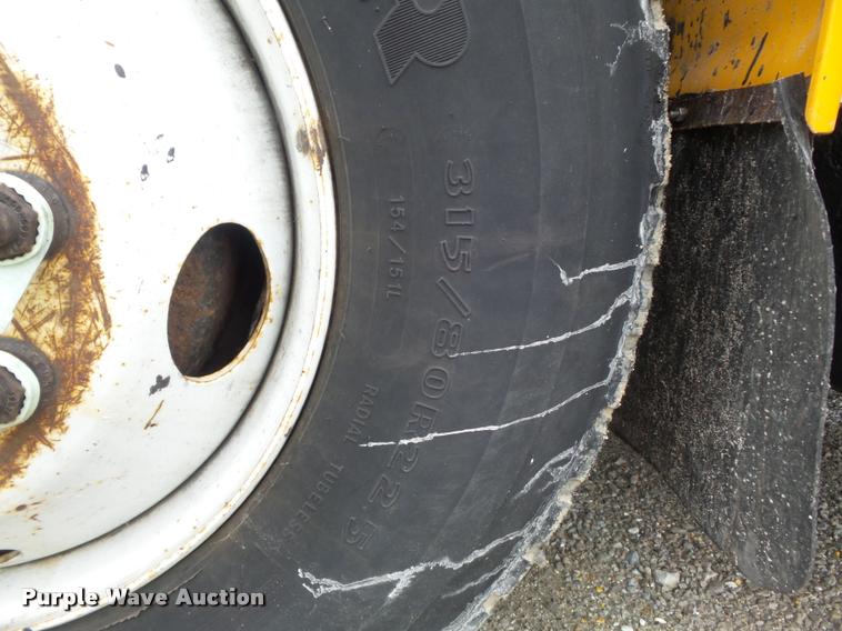 image for item K7628 2002 International 4900 Crew Cab dump truck