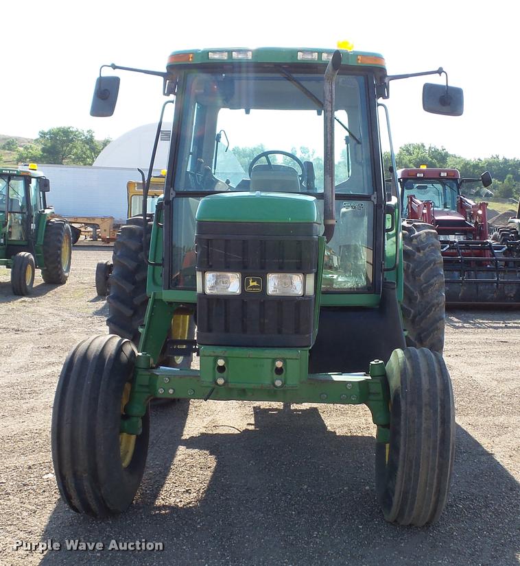 image for item DA1121 2001 John Deere 6310 tractor