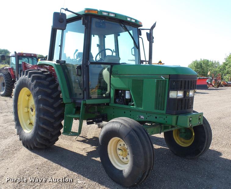 image for item DA1121 2001 John Deere 6310 tractor