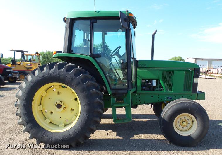 image for item DA1121 2001 John Deere 6310 tractor