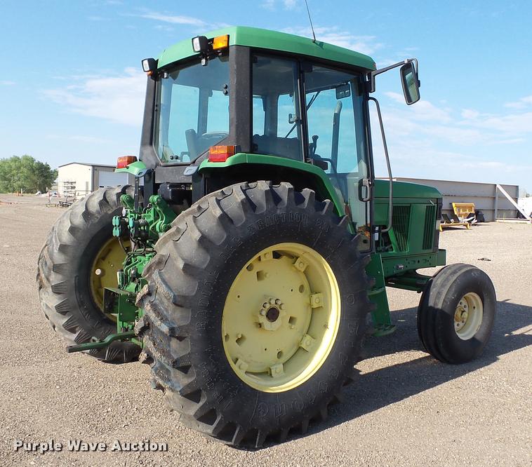 image for item DA1121 2001 John Deere 6310 tractor