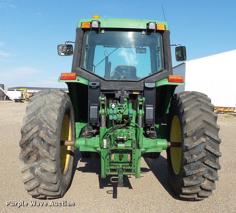 image for item DA1121 2001 John Deere 6310 tractor