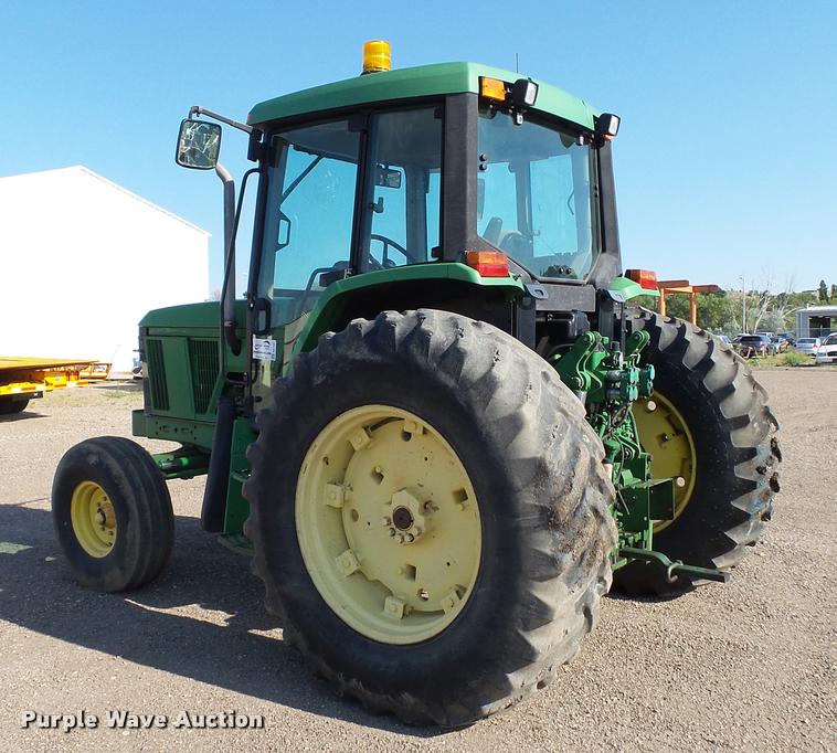 image for item DA1121 2001 John Deere 6310 tractor