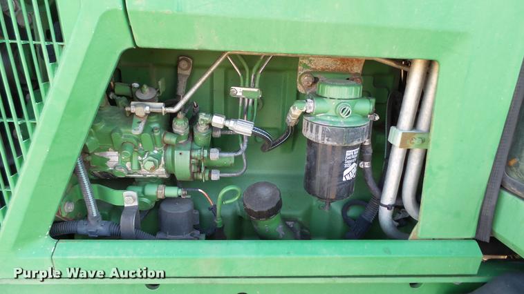 image for item DA1121 2001 John Deere 6310 tractor