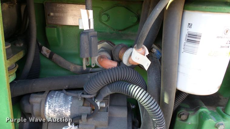 image for item DA1121 2001 John Deere 6310 tractor