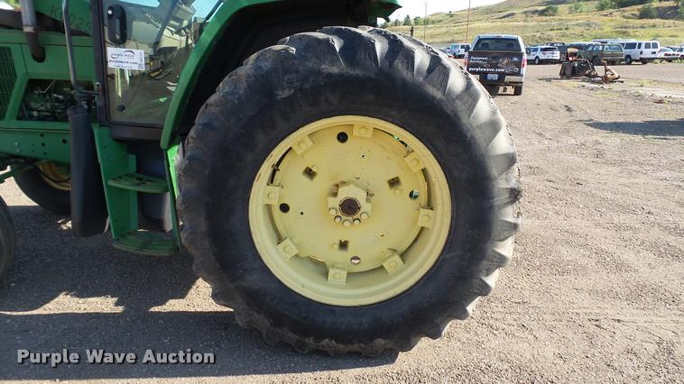 image for item DA1121 2001 John Deere 6310 tractor