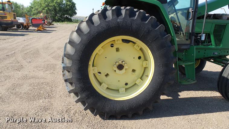image for item DA1121 2001 John Deere 6310 tractor