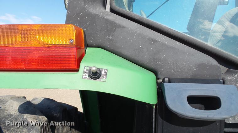 image for item DA1121 2001 John Deere 6310 tractor