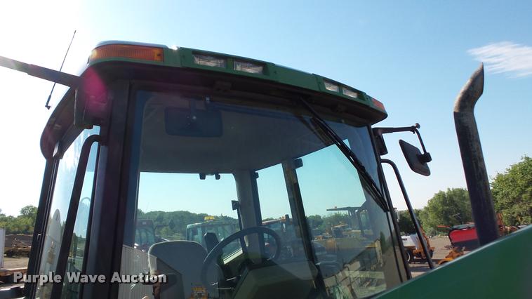 image for item DA1121 2001 John Deere 6310 tractor