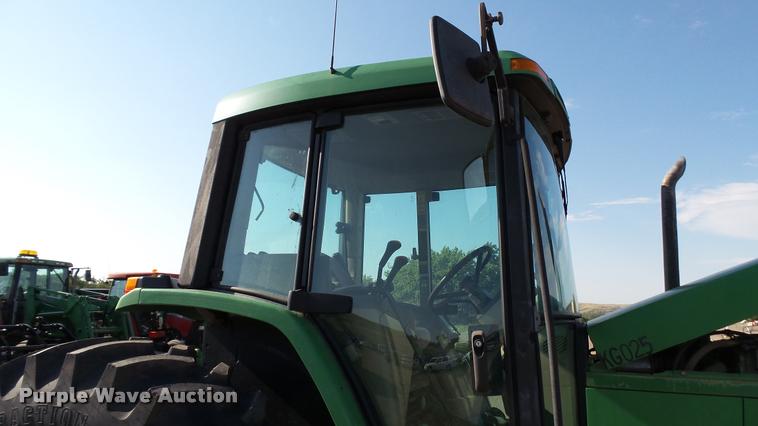 image for item DA1121 2001 John Deere 6310 tractor