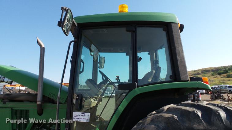 image for item DA1121 2001 John Deere 6310 tractor