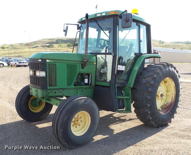 image for item DA1122 2001 John Deere 6310 tractor