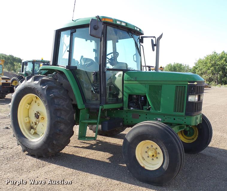 image for item DA1122 2001 John Deere 6310 tractor