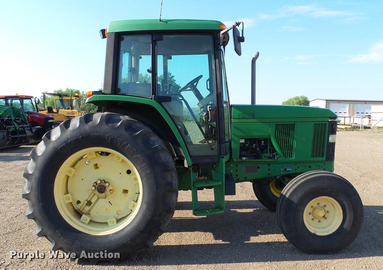 image for item DA1122 2001 John Deere 6310 tractor