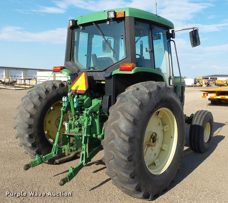 image for item DA1122 2001 John Deere 6310 tractor