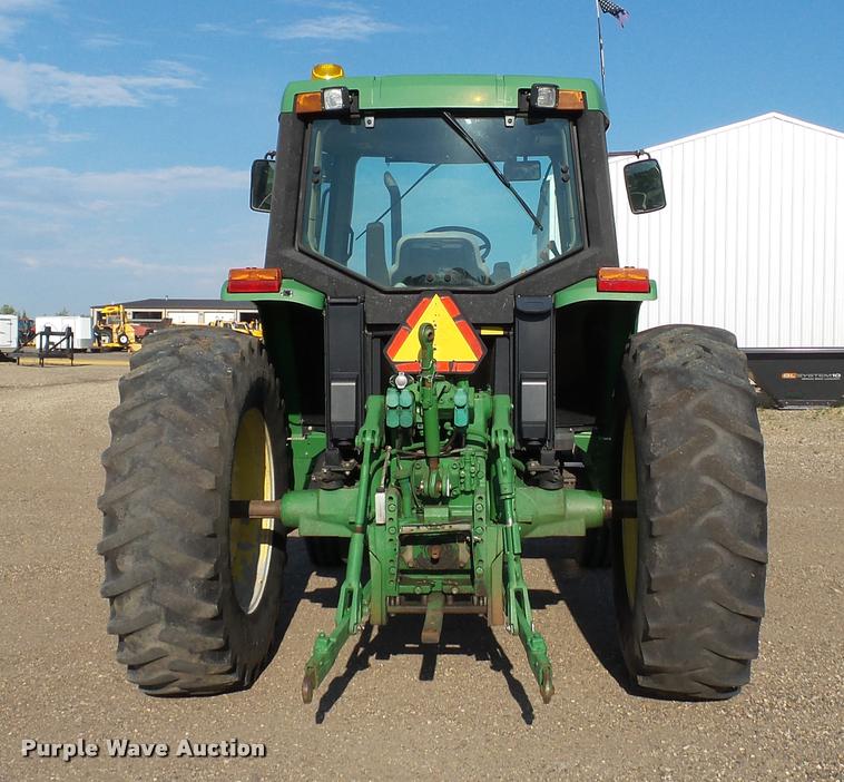 image for item DA1122 2001 John Deere 6310 tractor