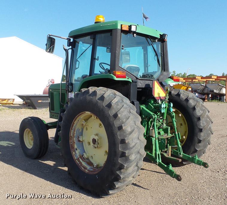 image for item DA1122 2001 John Deere 6310 tractor