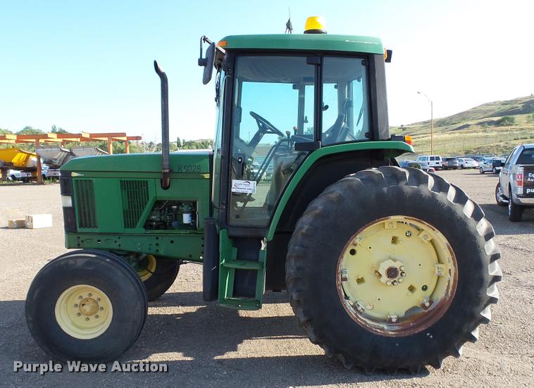 image for item DA1122 2001 John Deere 6310 tractor