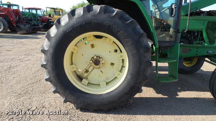 image for item DA1122 2001 John Deere 6310 tractor