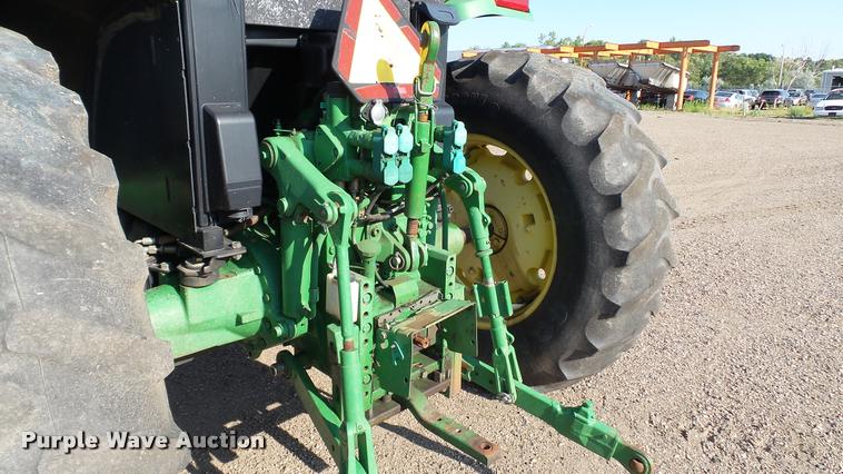 image for item DA1122 2001 John Deere 6310 tractor