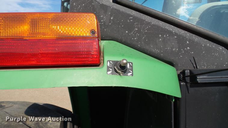 image for item DA1122 2001 John Deere 6310 tractor