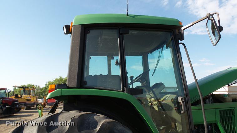 image for item DA1122 2001 John Deere 6310 tractor