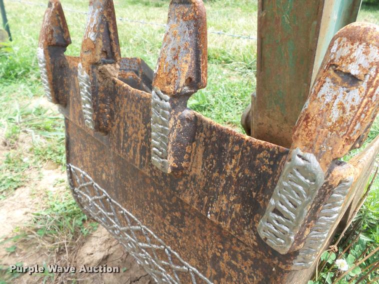 image for item K3257 John Deere backhoe attachment