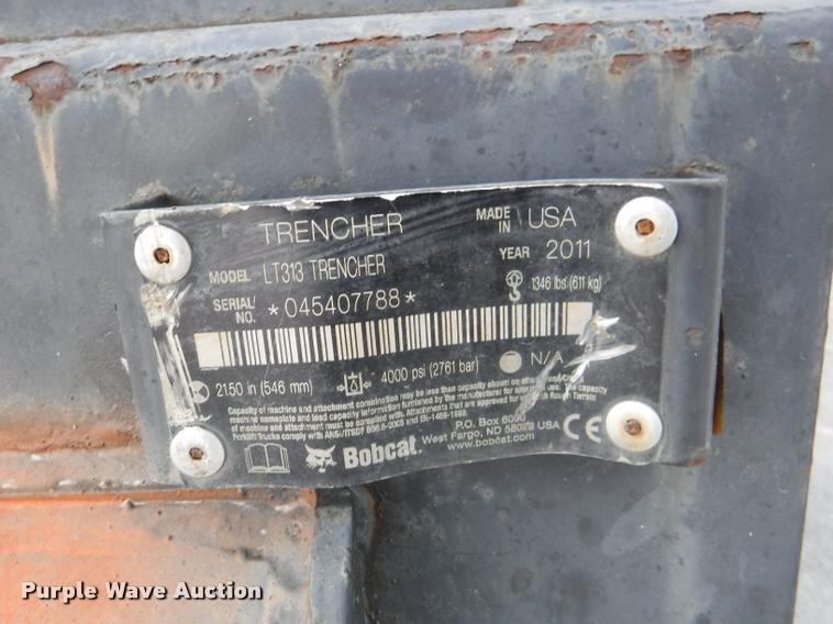 image for item BY9810 2011 Bobcat LT313 skid steer trencher