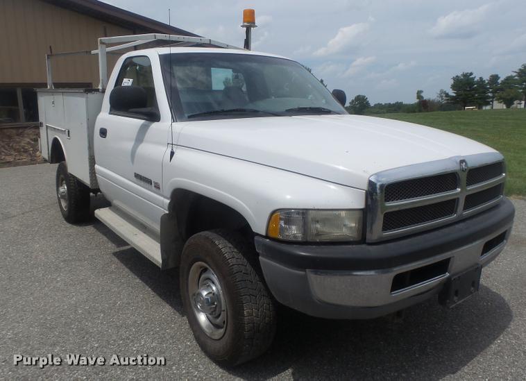 image for item DB1403 2001 Dodge Ram 2500 utility bed pickup truck