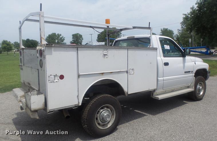 image for item DB1403 2001 Dodge Ram 2500 utility bed pickup truck