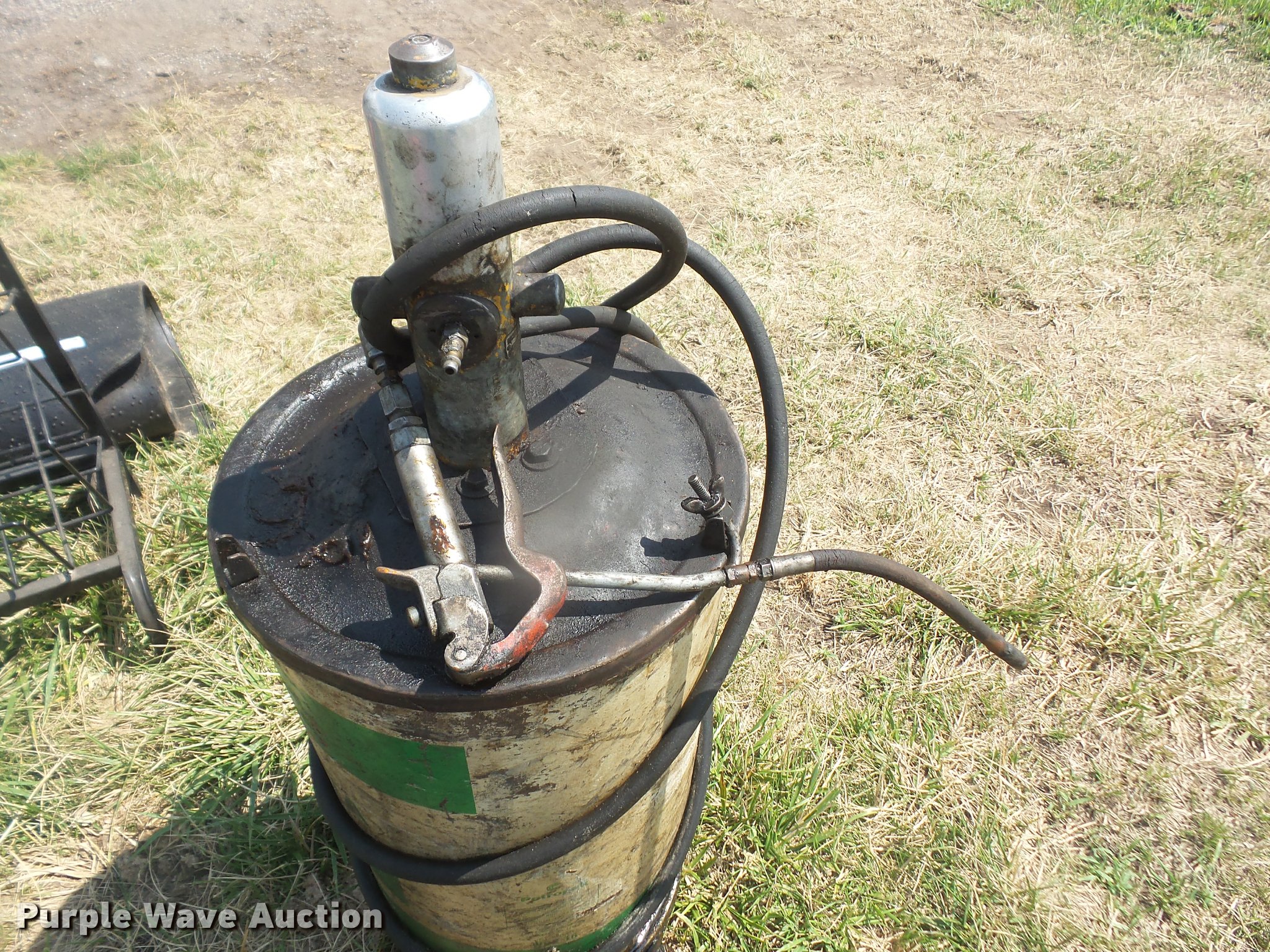 (2) grease barrels with pumps in Tecumseh, KS Item DK9451 sold