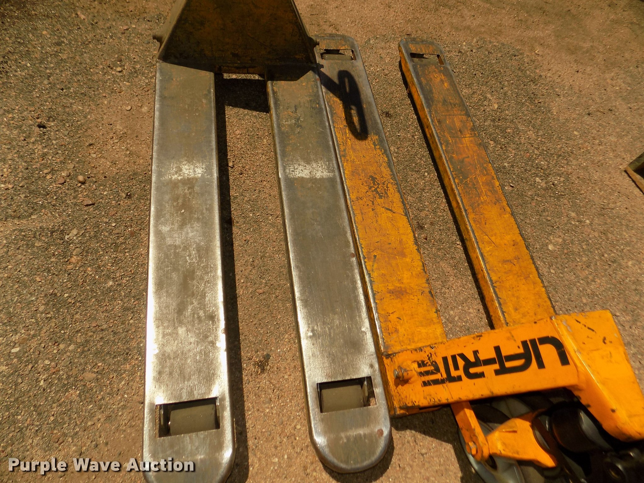 (2) Lift Rite L50 pallet jacks in Grand Island, NE Item DO9207 sold Purple Wave