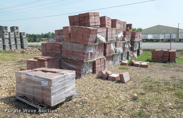 Approximately 75 pallets of retaining wall blocks in ...