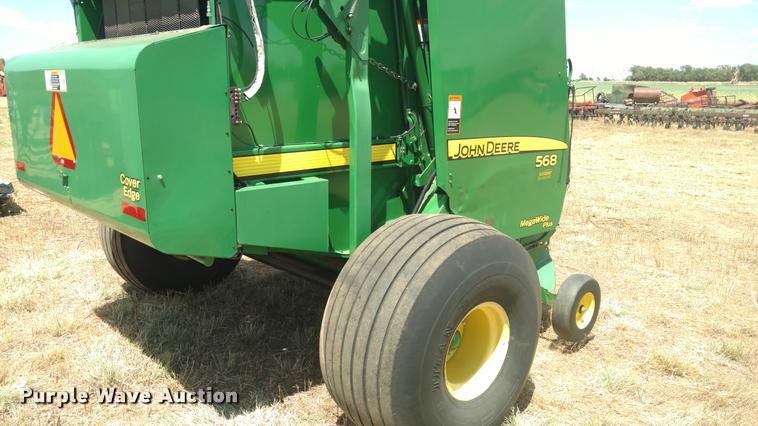 image for item DA5719 2010 John Deere 568 Mega Wide Plus round baler