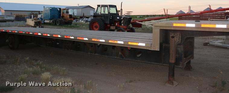 image for item DB9358 1999 Talbert TSDW-80K-T1-C drop deck equipment trailer