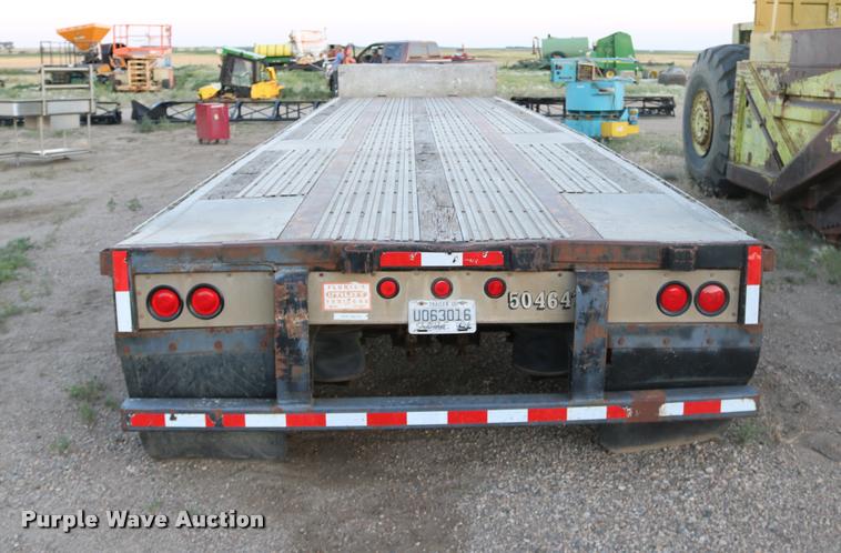 image for item DB9358 1999 Talbert TSDW-80K-T1-C drop deck equipment trailer
