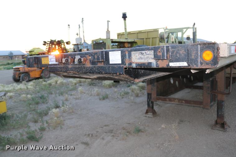 image for item DB9358 1999 Talbert TSDW-80K-T1-C drop deck equipment trailer
