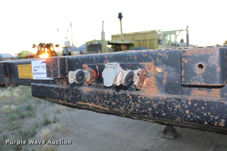 image for item DB9358 1999 Talbert TSDW-80K-T1-C drop deck equipment trailer