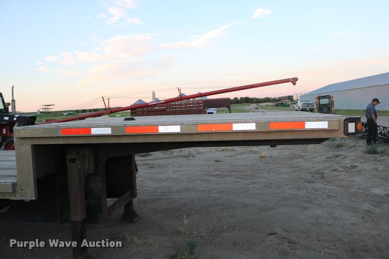 image for item DB9358 1999 Talbert TSDW-80K-T1-C drop deck equipment trailer