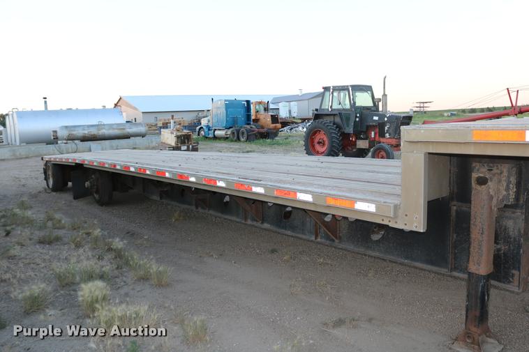 image for item DB9358 1999 Talbert TSDW-80K-T1-C drop deck equipment trailer