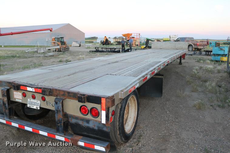 image for item DB9358 1999 Talbert TSDW-80K-T1-C drop deck equipment trailer