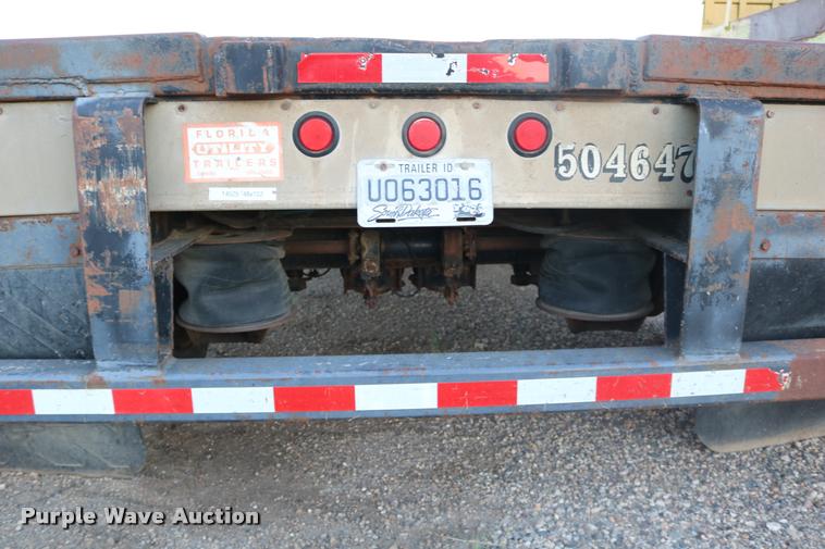 image for item DB9358 1999 Talbert TSDW-80K-T1-C drop deck equipment trailer