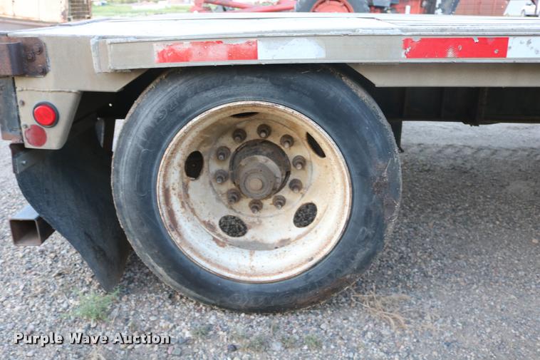 image for item DB9358 1999 Talbert TSDW-80K-T1-C drop deck equipment trailer