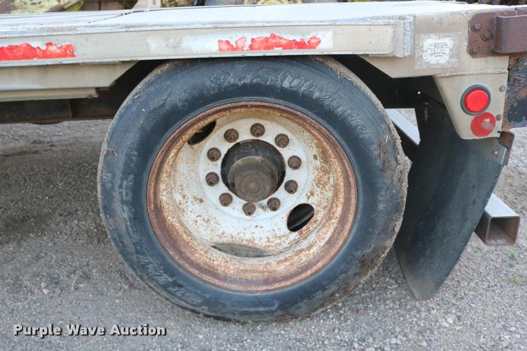 image for item DB9358 1999 Talbert TSDW-80K-T1-C drop deck equipment trailer