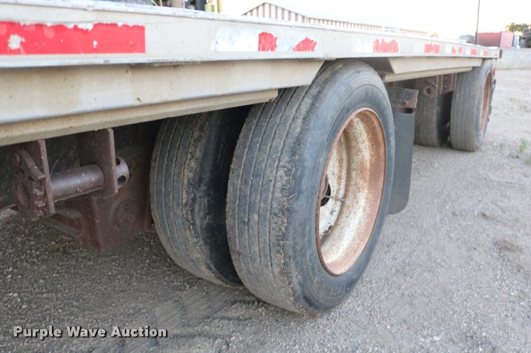 image for item DB9358 1999 Talbert TSDW-80K-T1-C drop deck equipment trailer