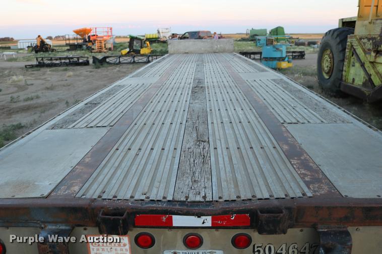 image for item DB9358 1999 Talbert TSDW-80K-T1-C drop deck equipment trailer