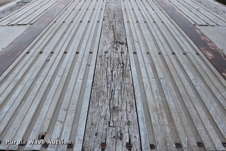 image for item DB9358 1999 Talbert TSDW-80K-T1-C drop deck equipment trailer