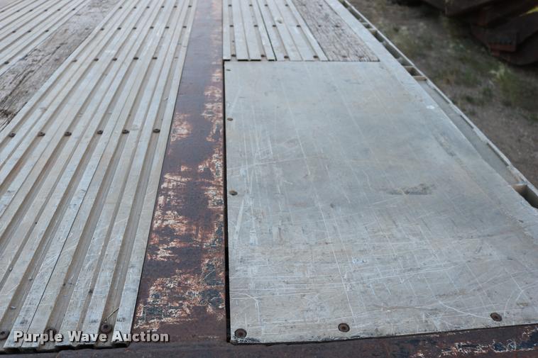 image for item DB9358 1999 Talbert TSDW-80K-T1-C drop deck equipment trailer